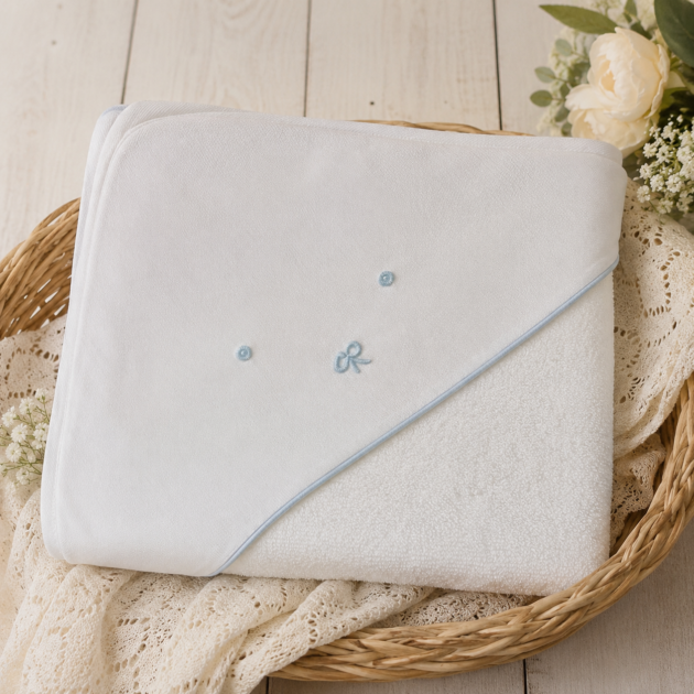 Triangolo spugna neonato con ricamo nodini d’amore | 9500 | TT
