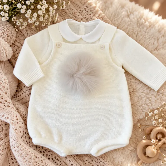 Pagliaccetto neonato elegante panna con pon pon